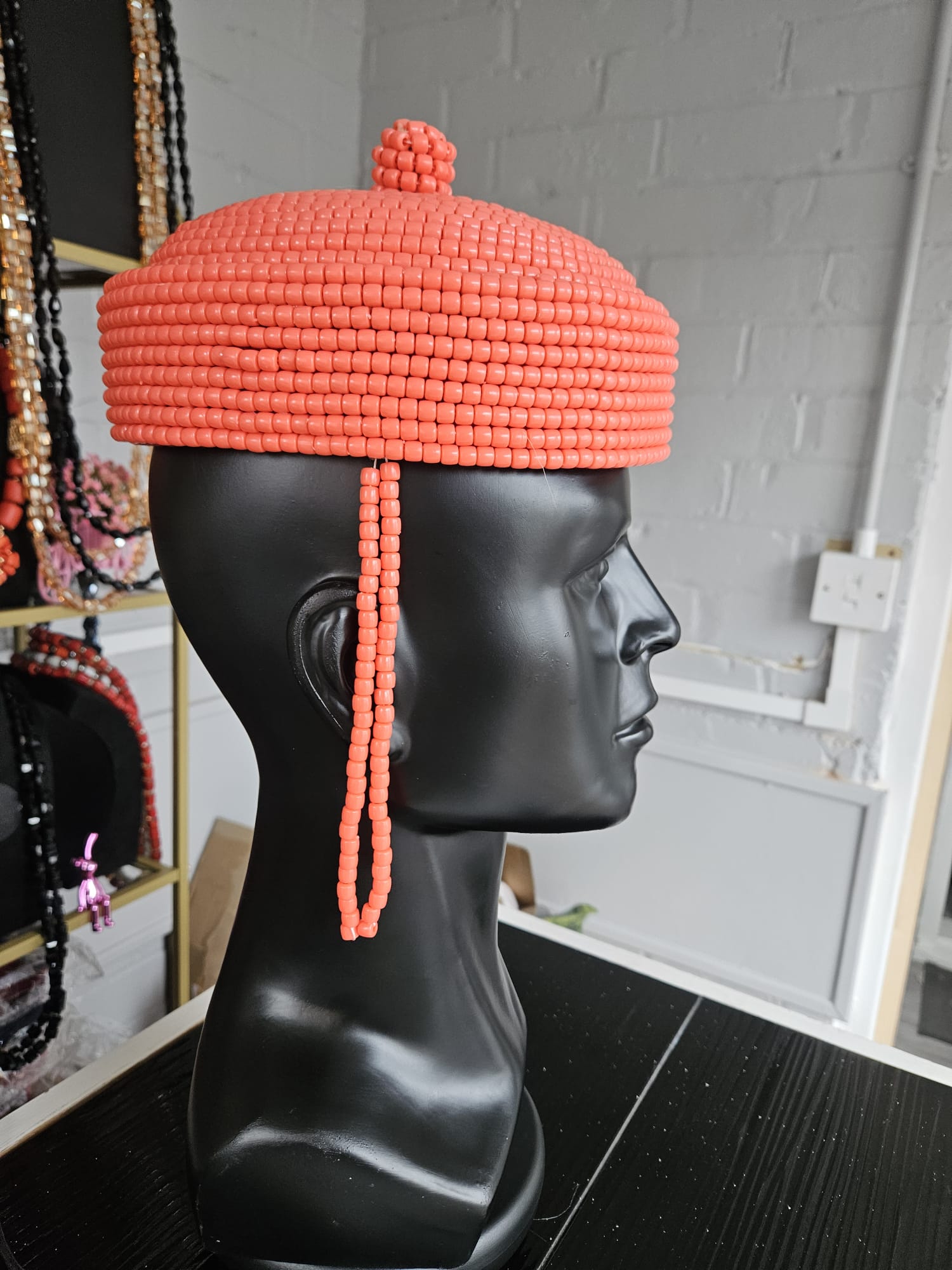Coral bead bracelet and earring sets on velvet
