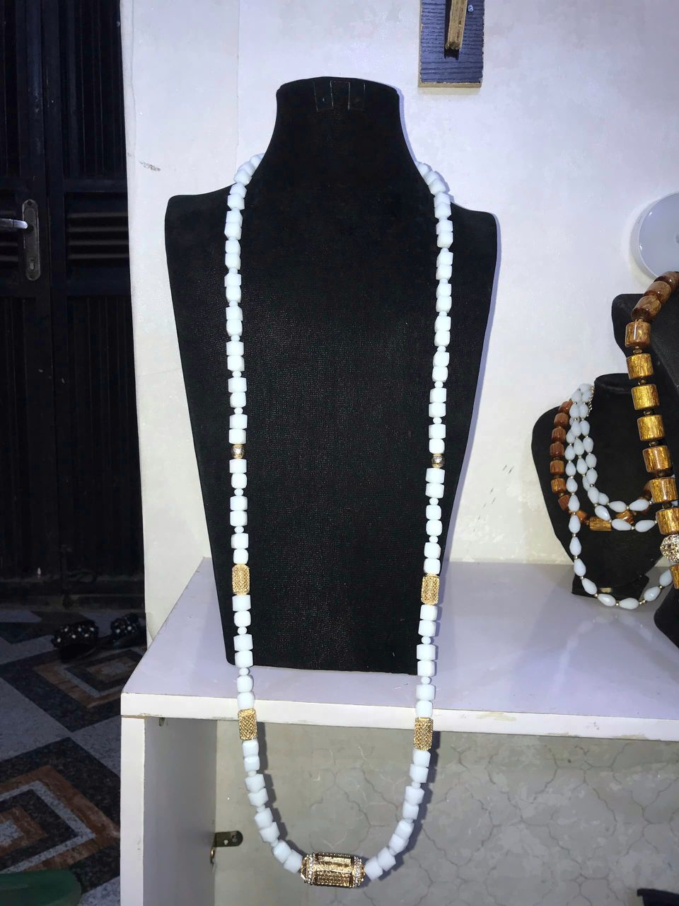 Coral bead bracelet and earring sets on velvet