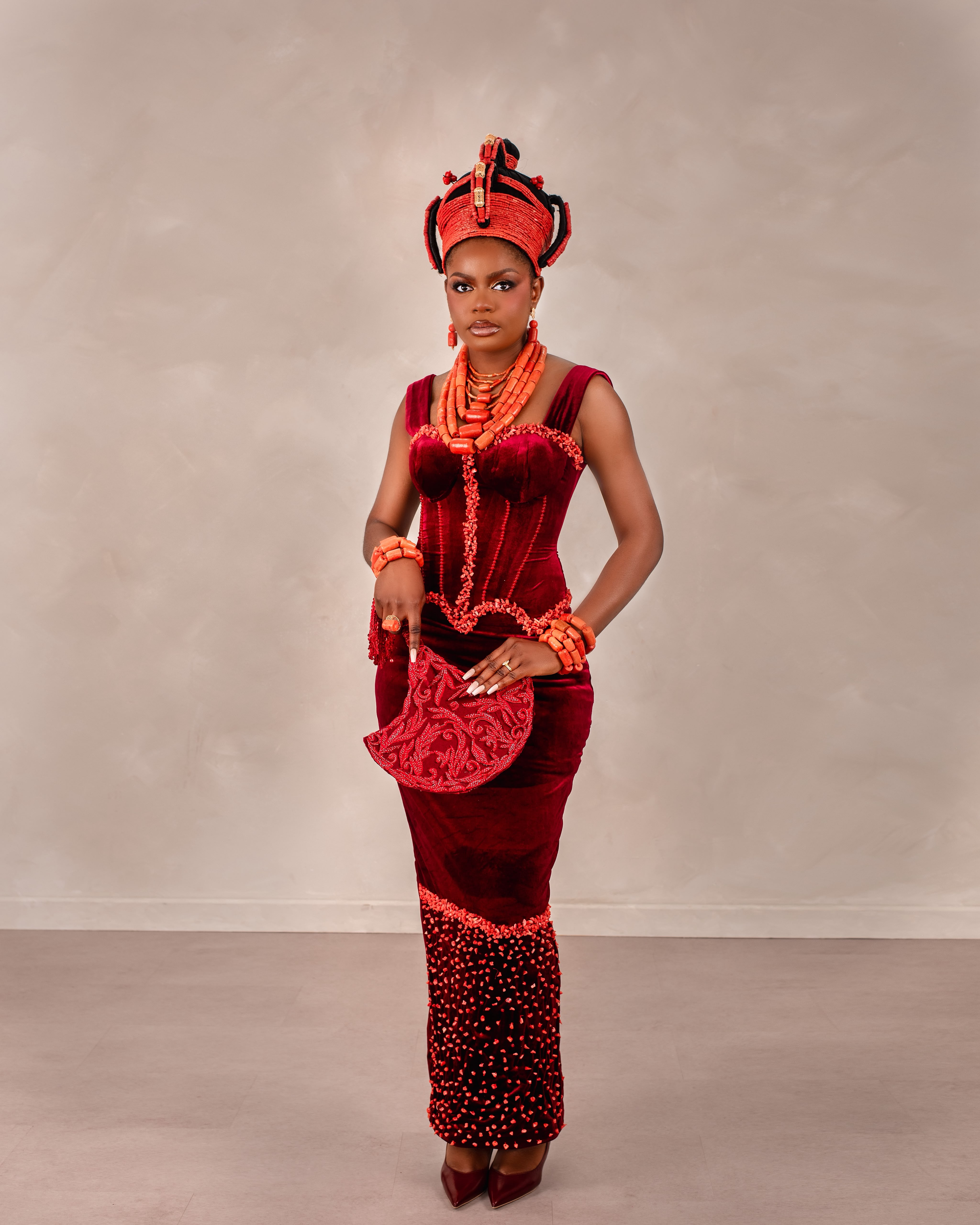 Edo bride in coral bead crown and purple attire