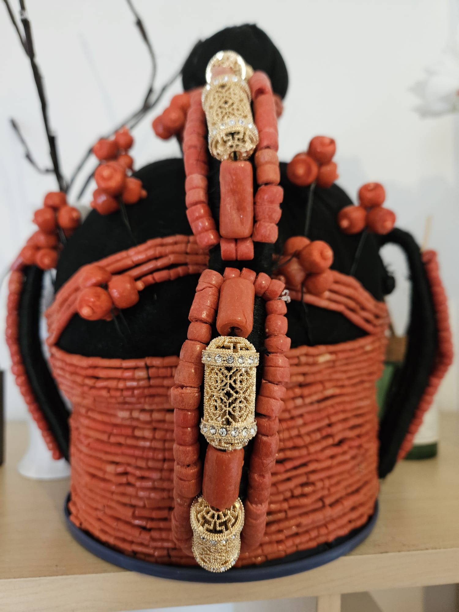 Coral bead bracelet and earring sets on velvet