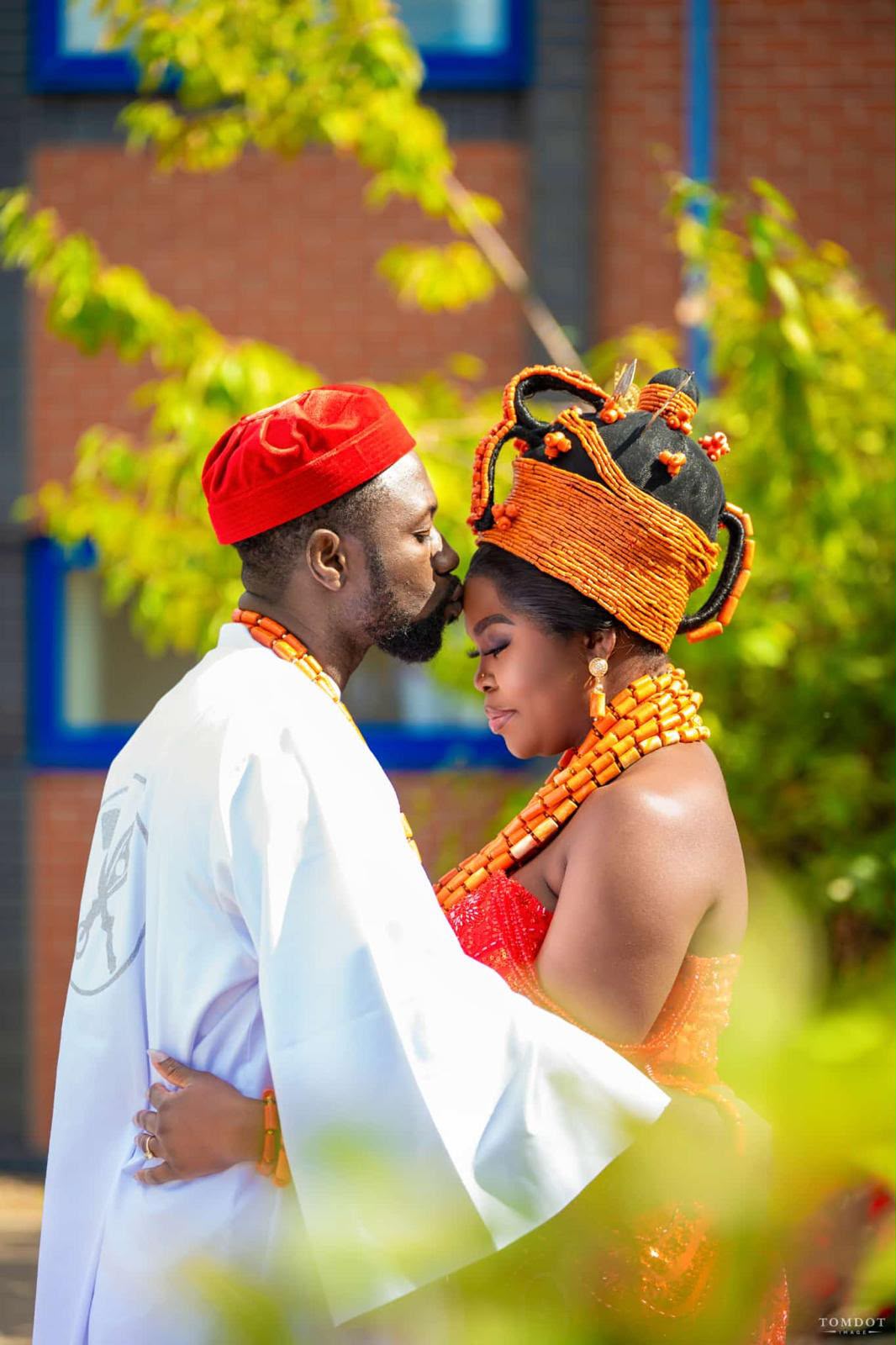 Beautiful Esan attire with coral bead headpiece